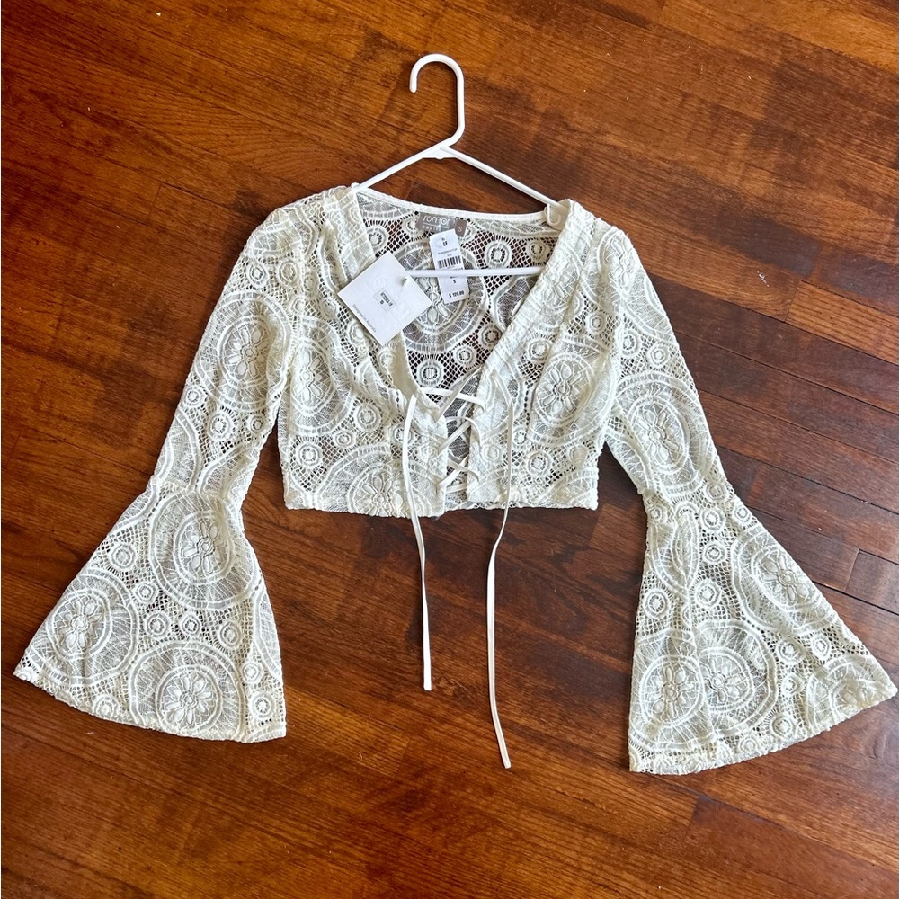 LF Rumor Boutique Cream Lace Cropped Bell Sleeve Lace Up Front Top